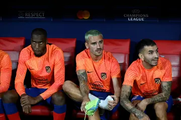 Because of transfer wrangle Antoine Griezmann (centre) is likely to spend at least half his season on the Atletico Madrid' bench