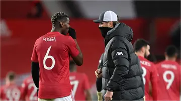 Panic for Solskjaer as lengthy chat between Liverpool boss Jurgen Klopp and Pogba is revealed