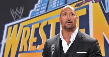 The Rock at a prmotional event for WrestleMania.