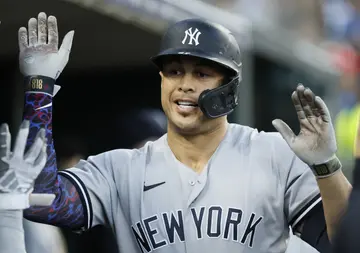 How much does Giancarlo Stanton earn per year? 