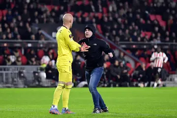 A PSV Eindhoven supporter was banned after attacking Sevilla's Serbian goalkeeper Marko Dmitrovic in February
