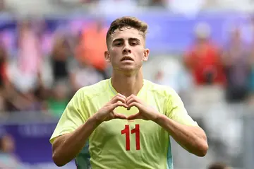 Fermin Lopez celebrates after giving Spain the lead against the Dominican Republic in Bordeaux