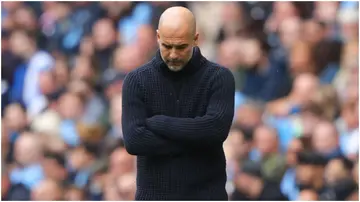 Pep Guardiola looks dejected during the Premier League match between Manchester City and Leeds United at Etihad Stadium. Photo by James Gill.