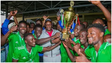 Homa Bay Combined Football Select lift the 2023 Eliud Owalo Super Cup. Photo: Eliud Owalo.