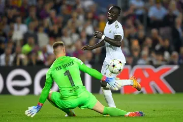 Bayern Munich's Sadio Mane beats Marc-Andre ter Stegen to net his team's first against Barcelona
