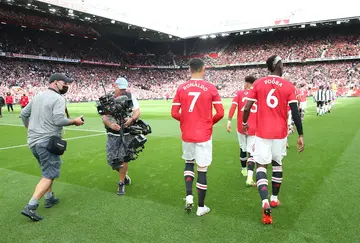 Man United players at Old Trafford during a past match. Photo by Matthew Peters.