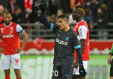 Alexis Sanchez scored twice to secure a Marseille win at Reims