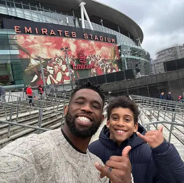 Siya Kolisi and his son watched Arsenal play Liverpool at the Emirates Stadium.