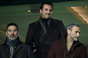 Qatar's emir, Sheikh Tamim bin Hamad al-Thani (C), attended PSG's Champions League clash with Bayern Munich on Tuesday