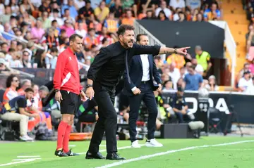 Diego Simeone and Atletico Madrid fell to a 3-0 hammering by Valencia in their last La Liga match ahead of the Madrid derby