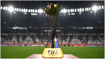 The winner's trophy is seen on a plinth at the side of the pitch prior to the FIFA Club World Cup Qatar 2020 Final between FC Bayern Muenchen and Tigres UANL at the Education City Stadium. Photo by David Ramos.