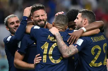 Olivier Giroud (2ndL) celebrates with his France teammates after scoring in Tuesday's 4-1 win over Australia for the World Cup holders