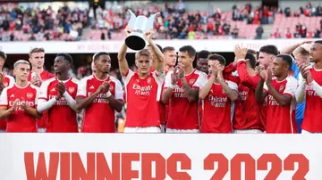 Martin Odegaard of Arsenal celebrates winning the Emirates Cup with his team mates during the pre-season friendly match between Arsenal FC and AS Monaco at Emirates Stadium. Photo by Jacques Feeney.