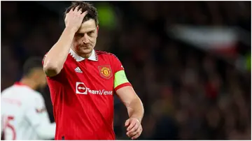 Harry Maguire looks dejected during the UEFA Europa League match between Manchester United and Sevilla at Old Trafford. Photo by Michael Zemanek.