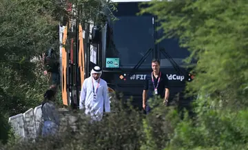Germany team official Oliver Bierhoff in front of the team bus as the side leave Qatar after their World Cup elimination