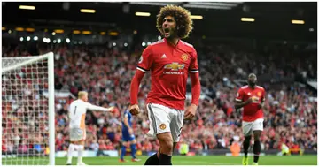 Marouane Fellaini celebrates scoring a goal during a Premier League match between Manchester United and Leicester City at Old Trafford in 2017. Photo by Michael Regan.