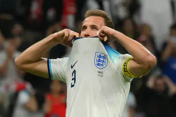 Harry Kane reacts after missing from the spot during England's World Cup quarter-final defeat against France