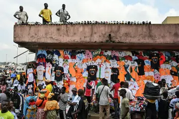 Business is brisk in football shirts at the markets in Ivory Coast, which hosts the Africa Cup of Nations from Saturday