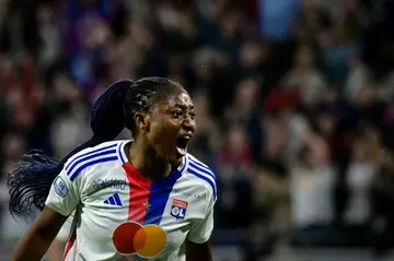 Kadidiatou Diani celebrates after scoring Lyon's second goal in the French season finale against Paris Saint-Germain