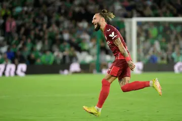 Nemanja Gudelj celebrates after his late equaliser for Sevilla in the Seville derby