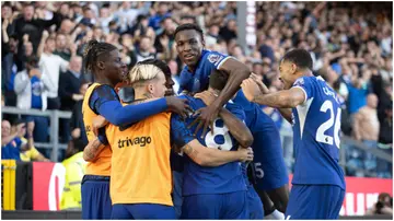 Nicolas Jackson celebrates with his teammates during the Premier League match between Burnley and Chelsea at Turf Moor. Photo by Pat Scaasi.