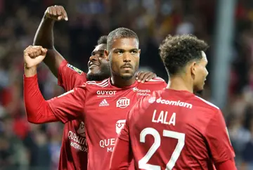 Brest striker Steve Mounie (C) celebrates after scoring his team's winning goal against Lyon last weekend