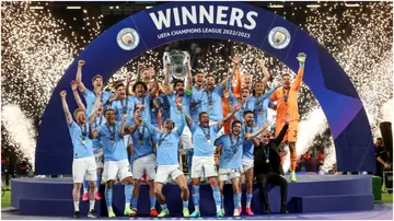 Ilkay Gundogan of Manchester City lifts the UEFA Champions League trophy after the team's victory at Ataturk Olympic Stadium. Photo by Berk Ozkan.