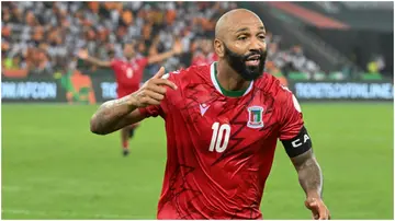 Equatorial Guinea's Emilio Nsue celebrates after scoring against Ivory Coast. Photo by Issouf Sanogo.