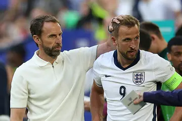 England's forward Harry Kane (R) has struggled this summer in Gareth Southgate side which has been dubbed 'boring' by many