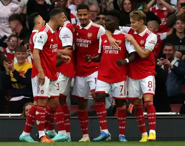 Arsenal celebrates scoring in their win over Liverpool