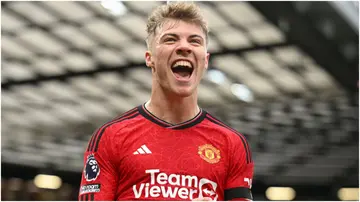 Rasmus Hojlund celebrates after scoring during the Premier League match between Manchester United and West Ham United at Old Trafford. Photo by Michael Regan.