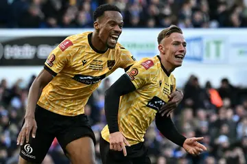 Maidstone's Sam Corne (right) scored the winner as they stunned Ipswich 2-1 in the FA Cup