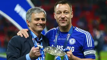Jose Mourinho and John Terry pose with the trophy during the Capital One Cup Final match between Chelsea and Tottenham Hotspur at Wembley Stadium. Photo by Clive Mason. 