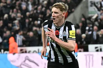 Newcastle's Anthony Gordon celebrates after scoring against Arsenal