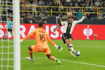 Leroy Sane beats France goalkeeper Mike Maignan to put Germany 2-1 ahead