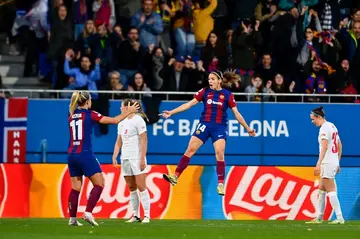 Barcelona midfielder Aitana Bonmati celebrates after scoring the opener against Brann as her team progressed to the semis