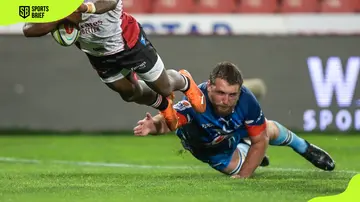 Gerhard Steenekamp (Blue) at the Emirates Airlines Park