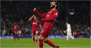 Liverpool's Mohamed Salah celebrates scoring their side's fourth goal of the game during the Premier League match at Elland Road. Photo by Tim Goode.