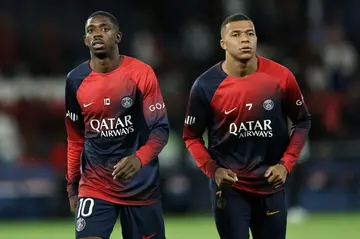 Kylian Mbappe saw several of his France teammates sign for PSG during the summer, including Ousmane Dembele (L)