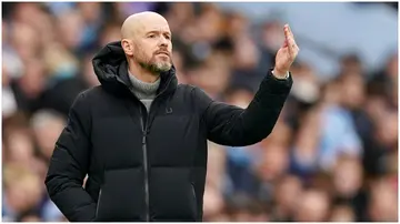 Manchester United manager, Erik ten Hag, gestures on the touchline during the Premier League match against Manchester City at the Etihad Stadium.