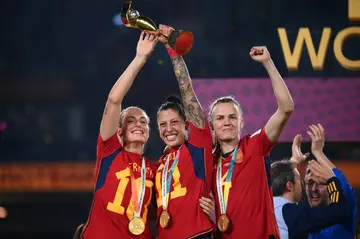 Jenni Hermoso (C) holds aloft the Women's World Cup after Spain's 1-0 victory in the final against England