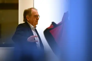 French Football Federation president Noel Le Graet leaves the French Sports Ministry after attending a hearing on Tuesday