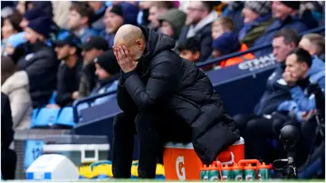 Pep Guardiola appears dejected during the Premier League match at the Etihad Stadium. Photo by Martin Rickett.