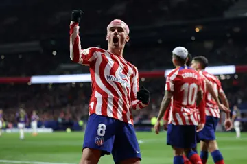 On target: Atletico Madrid's French forward Antoine Griezmann celebrates scoring his team's second goal against Valladolid