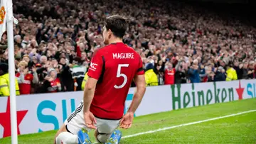 Harry Maguire celebrates after scoring during the UEFA Champions League match between Manchester United and F.C. Copenhagen at Old Trafford. Photo by Ash Donelon.