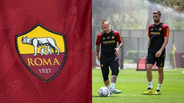 AC Roma logo and players practicing in the field