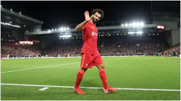 Mohamed Salah waves after being substituted during the UEFA Champions League group B match between Liverpool FC and AC Milan at Anfield. Photo by Simon Stacpoole.