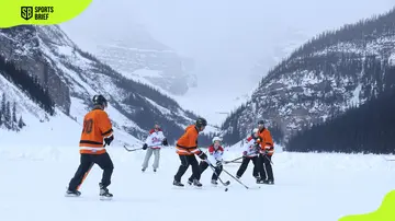 Shinny hockey played on surface of a frozen lake