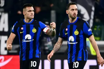 Lautaro Martinez (L) has scored 13 goals in as many Serie A games