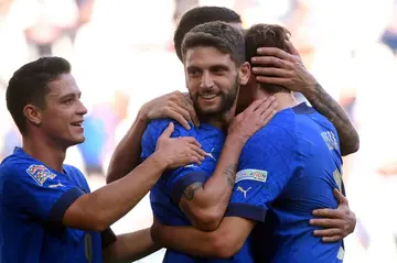 Domenico Berardi (C) netted twice in Italy's easy win over Malta